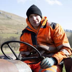 Reuben Owen sits on his vintage tractor. (Pic credit: Channel 5)