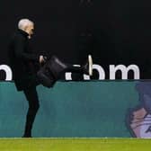 Jim Goodwin walks out Easter Road after he is sacked as Aberdeen manager.
