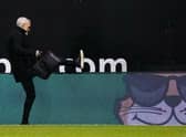 Jim Goodwin walks out Easter Road after he is sacked as Aberdeen manager.
