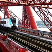 A visualisation of the Desiro Verve, Siemens Mobility's concept hydrogen or battery train for use on the British rail network, shown crossing the Forth Bridge. Picture: Siemens Mobility