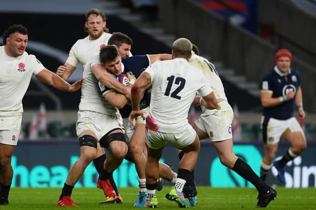 Welcome to international rugby, Cam. Scotland's new cap Cameron Redpath was right in the thick of the action against England at Twickenham