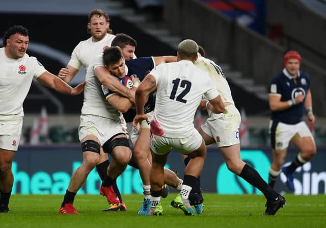 Welcome to international rugby, Cam. Scotland's new cap Cameron Redpath was right in the thick of the action against England at Twickenham