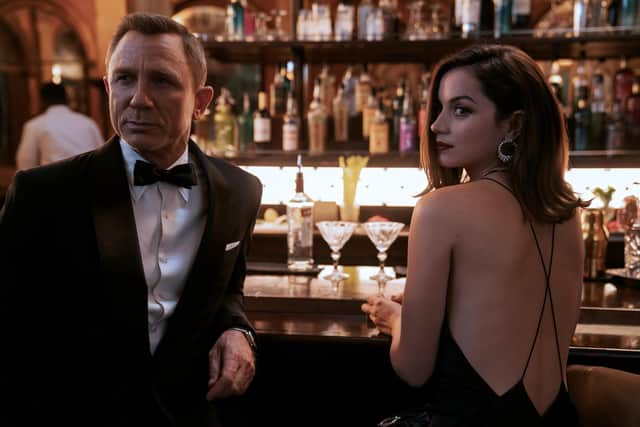 Daniel Craig as James Bond and Ana de Armas as Paloma in No Time To Die PIC: Nicola Dove © 2020 DANJAQ, LLC AND MGM.  ALL RIGHTS RESERVED.