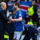 Philippe Clement (L) shakes the hand of Borna Barisic when he came off against Kilmarnock on Sunday - how the Rangers manager greets Celtic opposite number Brendan Rodgers this weekend will be interesting (Photo by Craig Williamson / SNS Group)