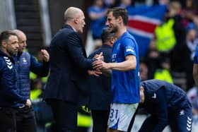 Philippe Clement (L) shakes the hand of Borna Barisic when he came off against Kilmarnock on Sunday - how the Rangers manager greets Celtic opposite number Brendan Rodgers this weekend will be interesting (Photo by Craig Williamson / SNS Group)