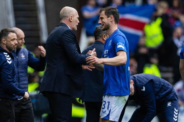 Philippe Clement (L) shakes the hand of Borna Barisic when he came off against Kilmarnock on Sunday - how the Rangers manager greets Celtic opposite number Brendan Rodgers this weekend will be interesting (Photo by Craig Williamson / SNS Group)