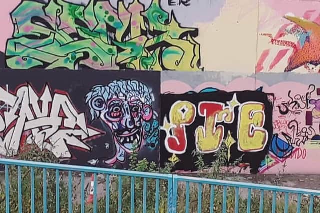 Legal graffiti walls are a creative use of temporary wasteground in urban spaces