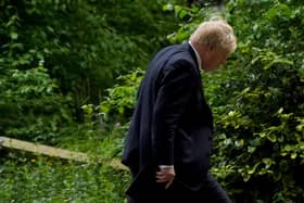 Prime Minister Boris Johnson heads to a press conference in Downing Street, London, following the publication of Sue Gray's report into Downing Street parties in Whitehall during the coronavirus lockdown. Picture date: Wednesday May 25, 2022.
