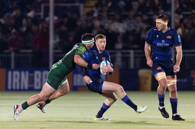 Match-winner Ben Healy, centre, tries to shake off Connacht's Tom Daly during Edinburgh's 25-22 victory in the BKT United Rugby Championship match at Hive Stadium. (Photo by Ross Parker / SNS Group)