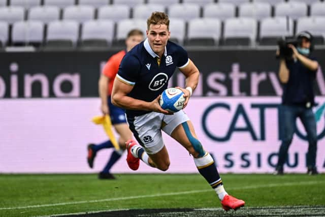 Scotland wing Duhan van der Merwe runs in to score a try during the Autumn Nations Cup match against Italy in Florence.