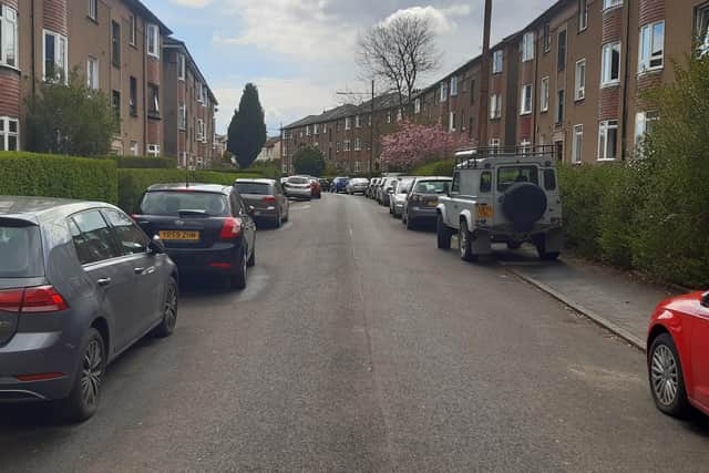Cars block both pavements on this Glasgow street which is an access route to a Scout group's hut. Picture: The Scotsman
