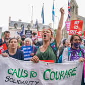 Members of the campaign group For Women Scotland demonstrate outside the Scottish Parliament at Holyrood in Edinburgh.