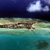 Tarawa, capital of the Republic of Kiribati and one of the many islands featured in Sea Change by Christine Gerhardt PIC: Torsten Blackwood / AFP via Getty Images