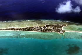 Tarawa, capital of the Republic of Kiribati and one of the many islands featured in Sea Change by Christine Gerhardt PIC: Torsten Blackwood / AFP via Getty Images