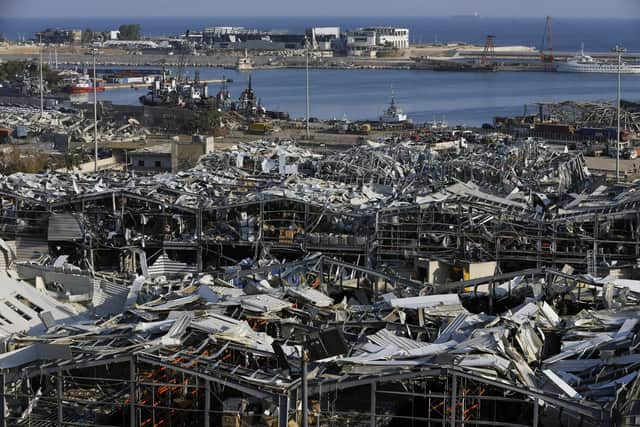 . The massive explosion rocked Beirut on Tuesday, flattening much of the city's port, damaging buildings across the capital and sending a giant mushroom cloud into the sky. (AP Photo/Bilal Hussein)