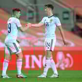 Jack Hendry, right, congratulates Kevin Nisbet after the latter's goal for Scotland against the Netherlands on Wednesday night. Picture: Getty