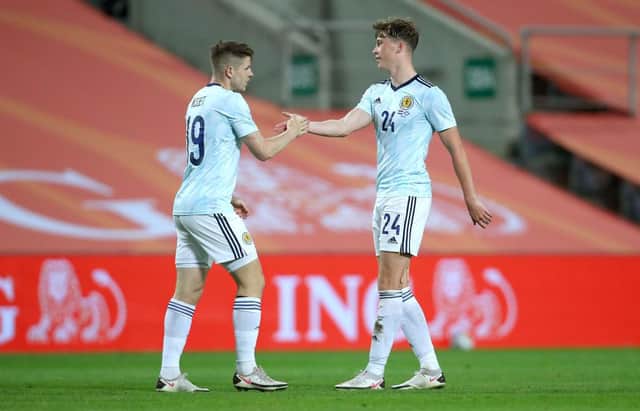 Jack Hendry, right, congratulates Kevin Nisbet after the latter's goal for Scotland against the Netherlands on Wednesday night. Picture: Getty