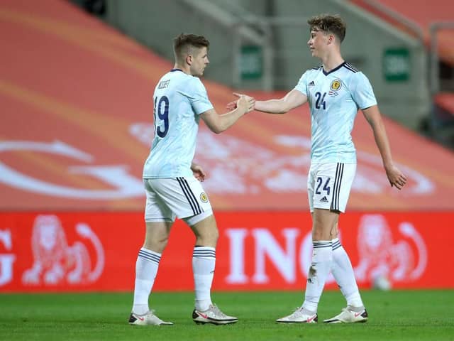 Jack Hendry, right, congratulates Kevin Nisbet after the latter's goal for Scotland against the Netherlands on Wednesday night. Picture: Getty