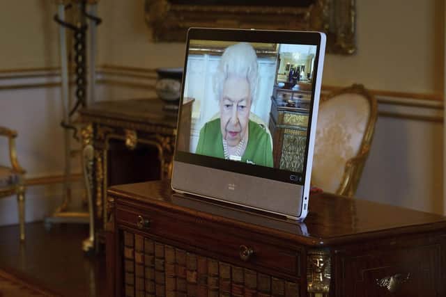 The Queen appears on a screen via videolink from Windsor Castle, where she is in residence, during a virtual audience to receive the Ambassador of Andorra