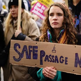 People take part in a protest outside Downing Street in Westminster.