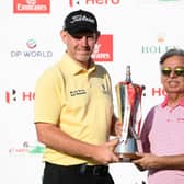 Stephen Gallacher receives the trophy from Dr Pawan Munjal, chairman and CEO of of Hero MotoCorp, after his win in 2019 - the last time it was staged. Picture: Ross Kinnaird/Getty Images.