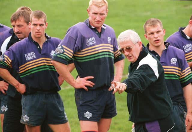 Jim Telfer working with the Scotland squad at Marr Rugby Club during the 1999 Rugby World Cup. Picture: PA