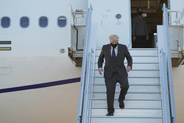 Prime Minister Boris Johnson departs the RAF Voyager as he lands in New York. Picture: Stefan Rousseau/PA Wire