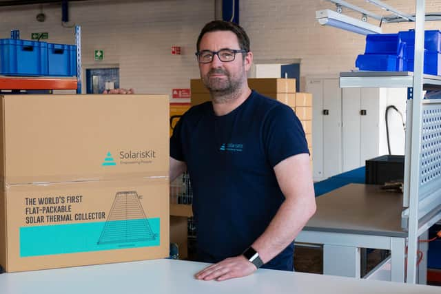 Service and installation manager Kris Aitchison with a packaged SolarisKit collector. Picture: contributed.