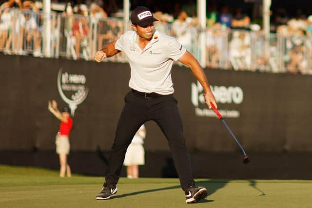 Viktor Hovland celebrates holing a 20-foot putt on the 18th green in the final round to seal a second successive victory in the Hero World Challenge at Albany in Nassau, Bahamas. Picture: Mike Ehrmann/Getty Images.