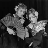 Patrick Fyffe (1942 - 2002, left), aka Dame Hilda Bracket, and George Logan (right), aka Dr Evadne Hinge, who died on Sunday performing in 1975. (Photo by Keystone Features/Hulton Archive/Getty Images)