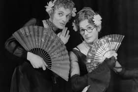 Patrick Fyffe (1942 - 2002, left), aka Dame Hilda Bracket, and George Logan (right), aka Dr Evadne Hinge, who died on Sunday performing in 1975. (Photo by Keystone Features/Hulton Archive/Getty Images)