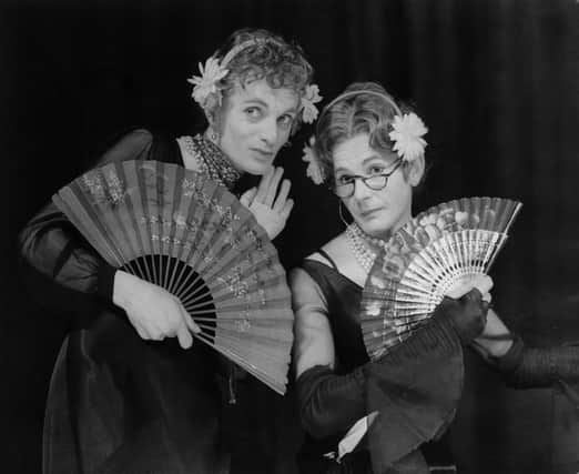 Patrick Fyffe (1942 - 2002, left), aka Dame Hilda Bracket, and George Logan (right), aka Dr Evadne Hinge, who died on Sunday performing in 1975. (Photo by Keystone Features/Hulton Archive/Getty Images)