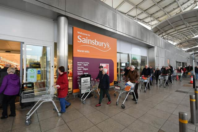 Shoppers queue outside a branch of Sainsbury's during the first lockdown in March 2020. Picture: Dan Mullan/Getty Images