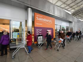 Shoppers queue outside a branch of Sainsbury's during the first lockdown in March 2020. Picture: Dan Mullan/Getty Images