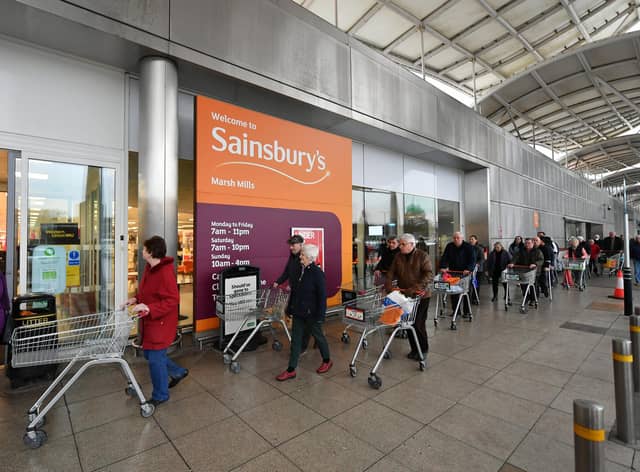 Shoppers queue outside a branch of Sainsbury's during the first lockdown in March 2020. Picture: Dan Mullan/Getty Images