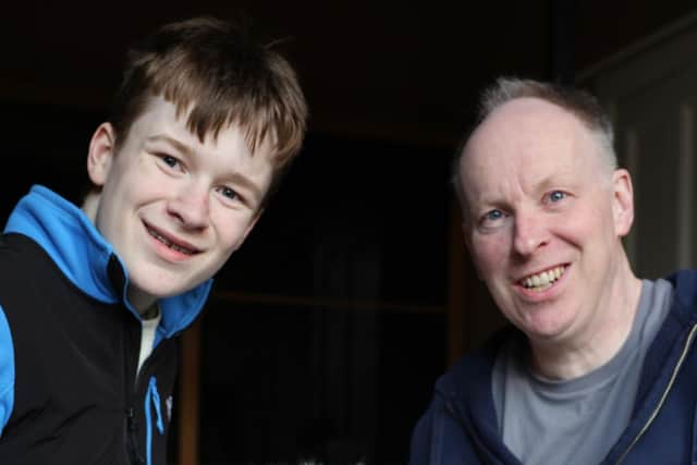 Colin Sim, 56, with son Diarmuid, 13