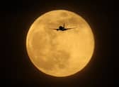 Supermoons appear bigger and brighter in the sky because they are slightly closer to the Earth (Getty Images)