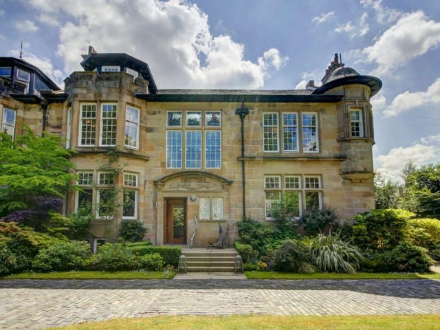 One of the finest homes in the West End of Glasgow, 40 Cleveden Drive has five bedrooms with ensuite bathrooms, a library, drawing room, dining room, entertaining kitchen, conservatory, games room, cinema, and a wrap around terrace with glass balustrade. There's also a private driveway and 0.37 acres of south facing gardens. The current owners are looking for a minimum of £2.9 million to sell.