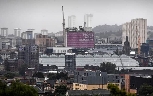 The motto 'People Make Glasgow' was seen by migrants as example of the welcoming and open nature of Scottish people (Picture: Andy Buchanan/AFP via Getty Images)
