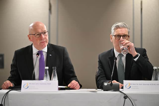 First Minister John Swinney (left) wants Keir Starmer and his UK Cabinet to bin National Insurance changes that would hurt charities (Picture: Andy Buchanan - Pool/Getty Images)