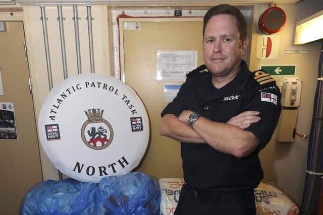 RN Commander Chris Hollingworth with the seized cocaine