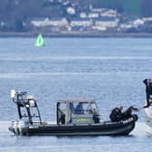 Police boats taking part in the rescue operation in the Firth of Clyde near Greenock (Pic:: Jane Barlow/PA Wire)