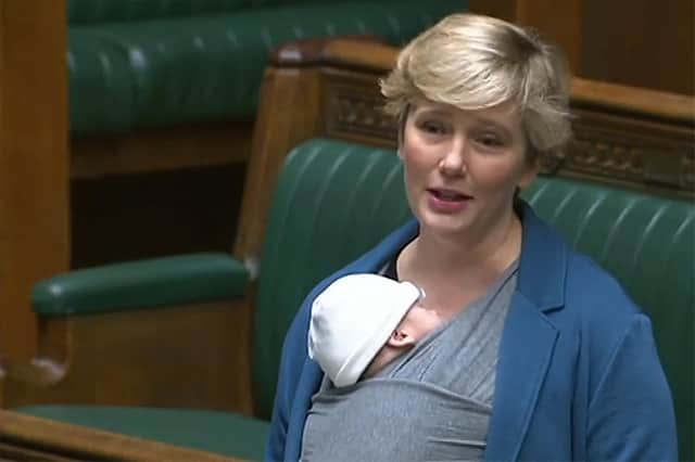 Stella Creasy speaking with her newborn baby strapped to her in the chamber of the House of Commons. She was later rebuked for bringing her sleeping child to a debate.
(Photo by HANDOUT/PRU/AFP via Getty Images)