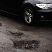 Poorly maintained roads are often a source of public concern (Picture: Jeff J Mitchell/Getty Images)