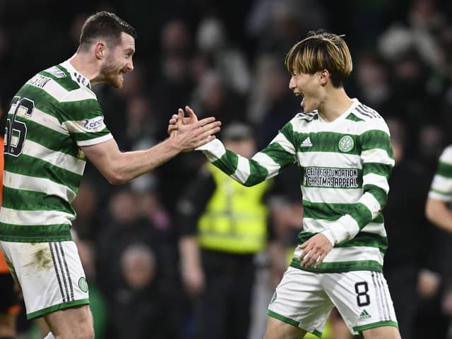 Celtic's Anthony Ralston (left) and Kyogo Furuhashi celebrate after the 4-2 win over Dundee United. (Photo by Rob Casey / SNS Group)