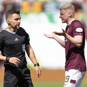 Nick Walsh sent off Alex Cochrane for a foul on Daizen Maeda.  (Photo by Ross Parker / SNS Group)