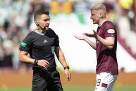 Nick Walsh sent off Alex Cochrane for a foul on Daizen Maeda.  (Photo by Ross Parker / SNS Group)