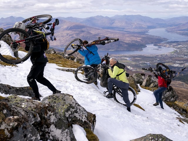 The riders head to the mountain around midday to prepare for the start of the race.