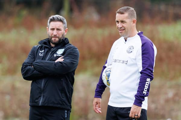 Hibs assistant manager Adam Owen (right) with manager Lee Johnson. (Photo by Ross Parker / SNS Group)