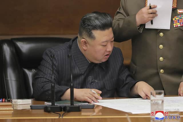 North Korean leader Kim Jong Un has vowed to enhance his nuclear arsenal in more “practical and offensive” ways in the face of his rivals’ “frantic” military exercises, state media said.